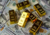 Why Gold IRAs are Worth Your Attention Gold bars, dollars. Gold IRAs on US dollar banknotes