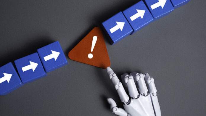 Robot Hand Touching a Red Warning Triangle Symbol on Gray Background Concept of Artificial Intelligence Error Handling and Risk Management AI Adoption Fails