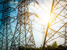 AI’s Power Hunger Reshaping the U.S. Utility Industry and Sparking a New Wave of Consolidation High voltage post or High voltage tower
