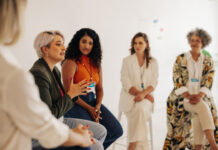 Confident businesswomen having a discussion during a conference meeting. Group of multicultural businesswomen sharing ideas while working together in an all-female startup.