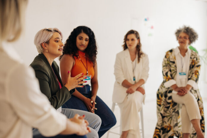 Confident businesswomen having a discussion during a conference meeting Confident businesswomen having a discussion during a conference meeting. Group of multicultural businesswomen sharing ideas while working together in an all-female startup.