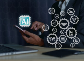 Jim Cavellier: How To Turn AI Adoption Into Measurable Business Transformation Business people are using AI technology, artificial intelligence, planning strategies. and business development Using a mobile smartphone on a global network. AI Adoption Business Transformation