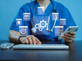 Medical professional using laptop with AI icons, checklist and healthcare technology interface, symbolizing artificial intelligence in medicine, smart data management, digital healthcare innovation.