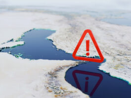 The Hormuz Catastrophe: The Netanyahu and Trump Administrations Knew the Risks—and Escalated Anyway Strategic Alert, map of the Strait of Hormuz featuring a large red warning icon.