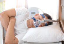 Sleep Apnea Treatment Options Have Expanded Considerably Over Recent Years Sleep Apnea Treatment Options - Man in bed wearing CPAP mask