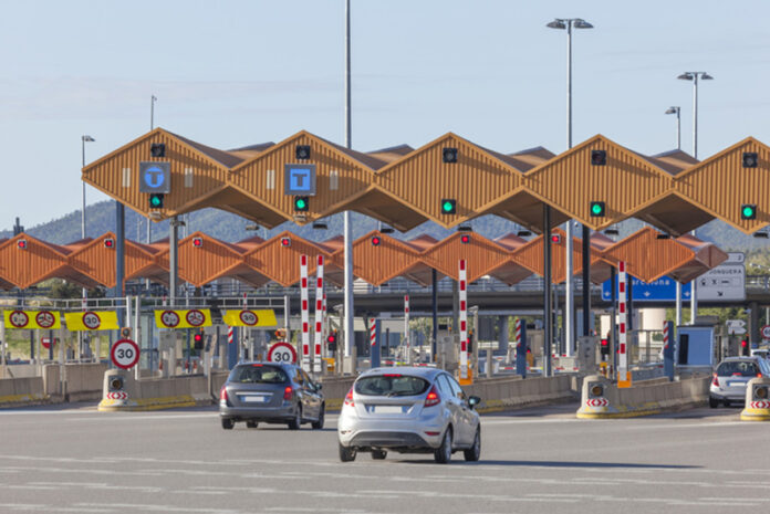 Toll gate on the highway The Hidden, Long-Term Toll of Car Accidents