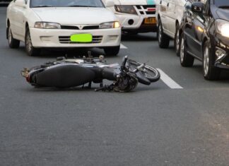 Personal Accident Cover - motorcycle lying on the road
