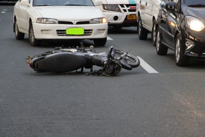 pexels-valentin-sarte-2902892-12002262 Personal Accident Cover - motorcycle lying on the road