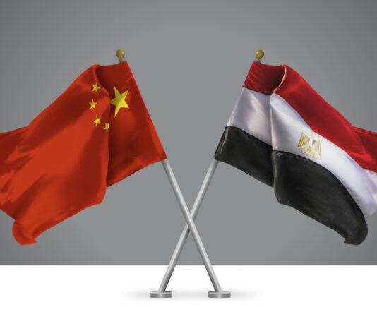 3D illustration of Two Wavy Crossed Flags of China and Egypt, Sign of Chinese and Egyptian Relationships
