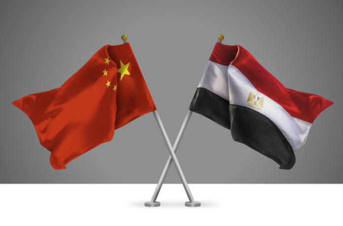 3D illustration of Two Wavy Crossed Flags of China and Egypt, Sign of Chinese and Egyptian Relationships