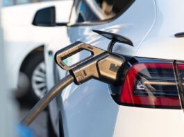 New York’s EV Rollout Has a Blind Spot: Not Enough Electricians to Build It New York EV Rollout - EV car at charging station