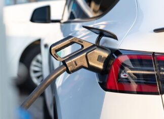 New York EV Rollout - EV car at charging station