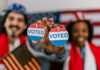 voting in the U.S., wearing American flag caps and showing happiness and civic pride while watching the elections.